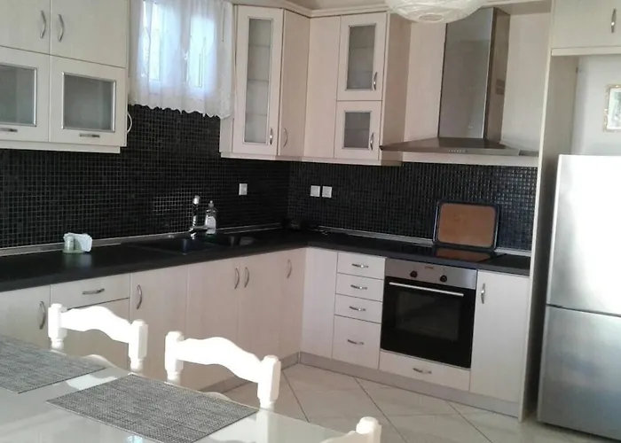 Three Palm House Parasporos